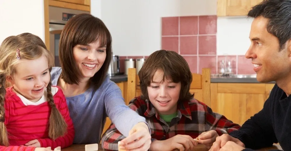 A family enjoying time together at their kitchen table