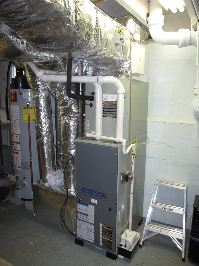 Gas furnace with add-on AC system and hot water tank