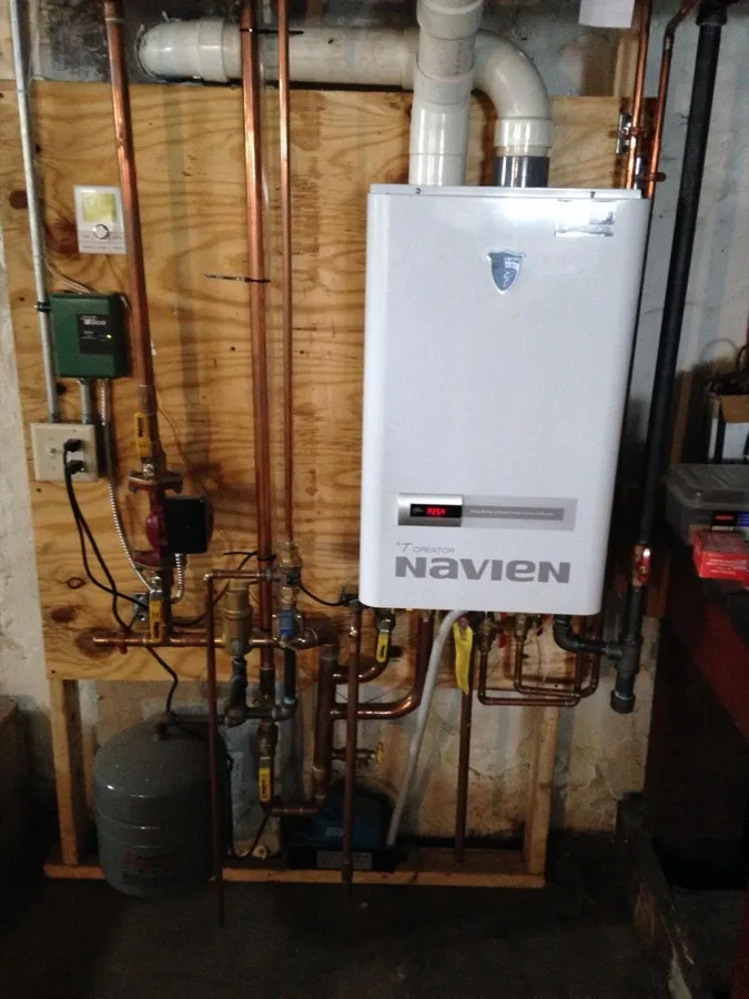 Wall-mounted Navien high-efficiency gas boiler for domestic hot water